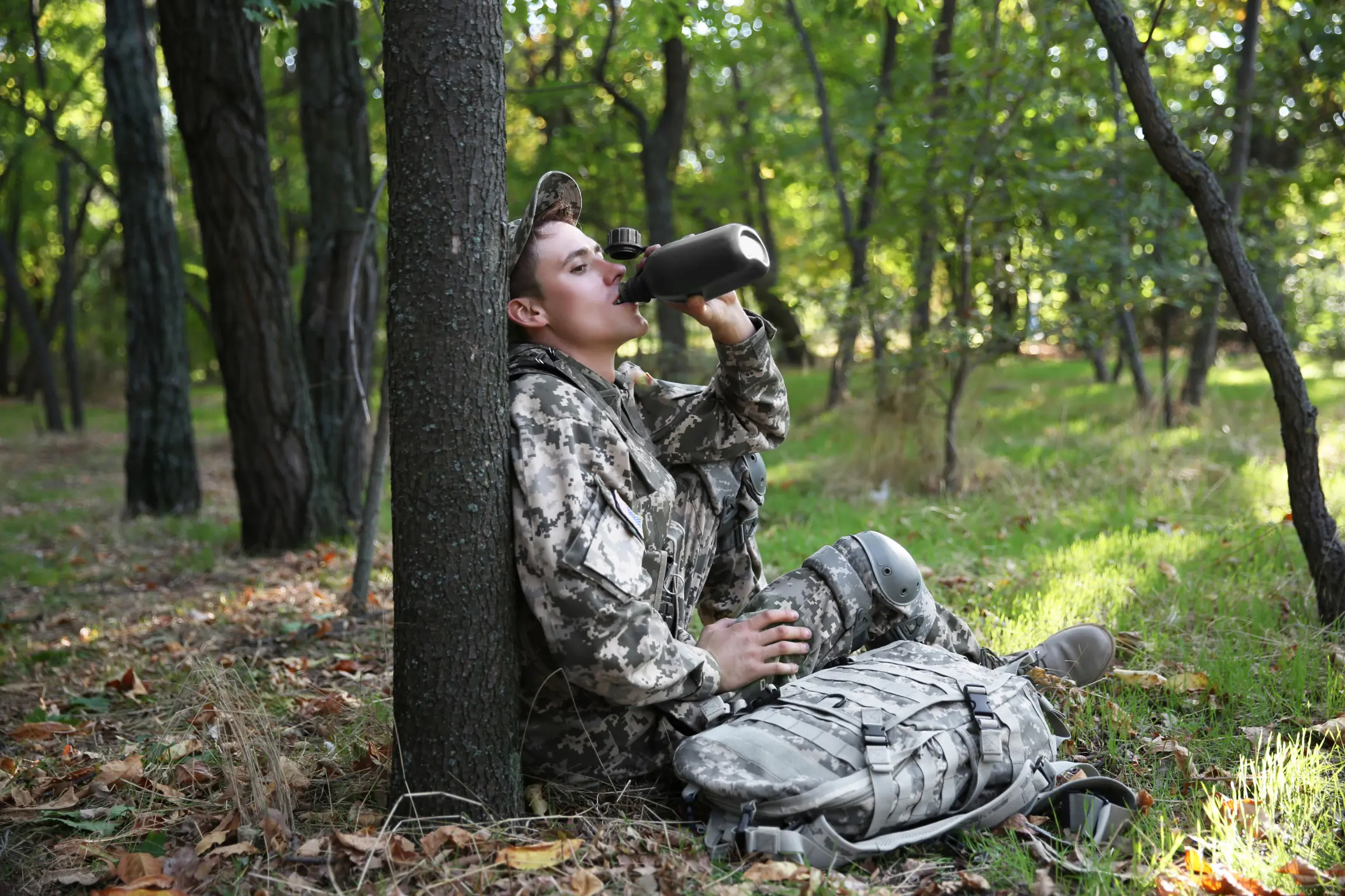 Soldier drinking from canteen