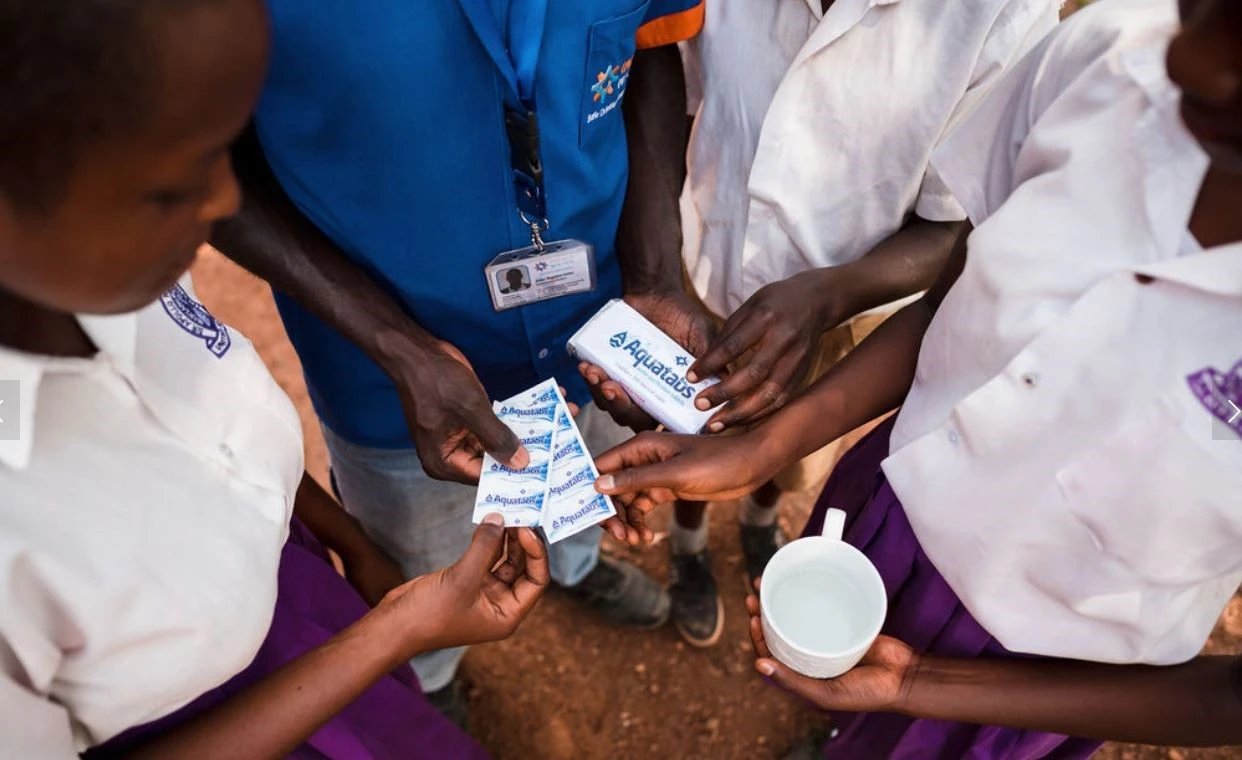 Access to clean water through Aquatabs tablets, an example of on-the-ground solutions supported by initiatives like Climate Finance for WASH